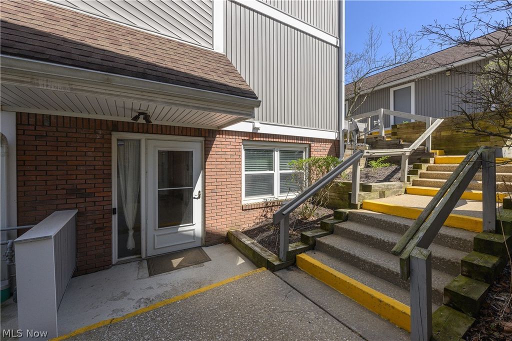 Photo of 243 Portage Lakes Drive #E, Akron, OH 44319 (MLS # 5200076)