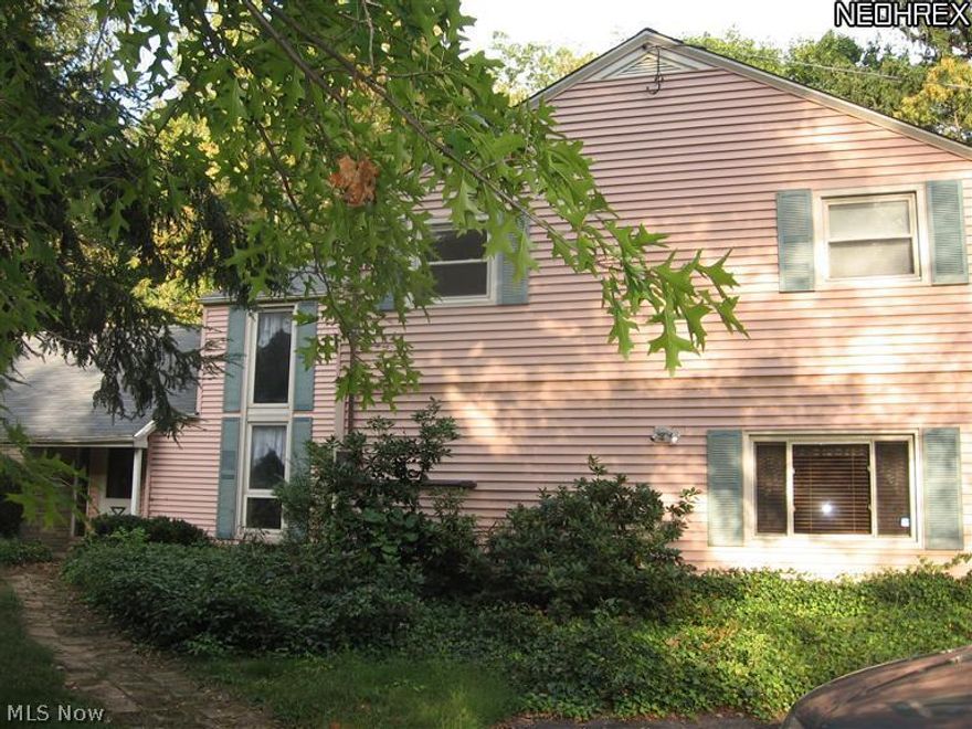 This is a diamond in the rough. Seller will consider a reasonable offer as the home does need much updating & work. This is a spacious home with 5 BDRMS & lots of possibilities on a beautiful scenic lot! One of the nicest settings in Madison with Acola creek running through the property. Lush landscaping provides privacy w/ mature trees. There is a tennis court which can also be a secondary parking area. The home has lots of space w/ 3 BDRMS & a bath on the 1st flr & 2 BDRMS & a bath on the 2nd flr as well as a huge unfinished area accessible from a BDRM. Large country kitchen w/ all appliances, laundry room, formal DR & a huge Living Room with a lovely WBFP compliment the 1st flr. There is also a paneled FR w/ a woodburner to supplement the heating system. This home is waiting for a new owner to personalize & update it. So much room, such a beautiful setting, close to town ,nor far from Rt 90. Quick occupancy!