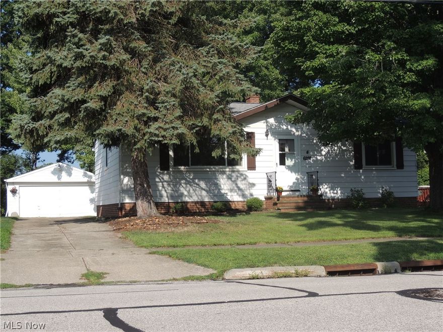 Wonderfully maintained 3 bedroom ranch with 2 full baths.  New Wood Floors, original hardwoods too, kitchen opens to dining room for great entertaining.  Large laundry room and family room in basement.  Bar with recreation areas provides more enjoyment in basement.  Standard size refrigerator behind bar stays!  All Kitchen appliances stay!  Workshop for handyman also in basement.  The roof, electric, and plumbing have been previously updated.  New Furnace 2015.  Gorgeous private backyard overlooking Kurtz Park.  Oversized 2 car garage.  Make this home ready to be yours today.