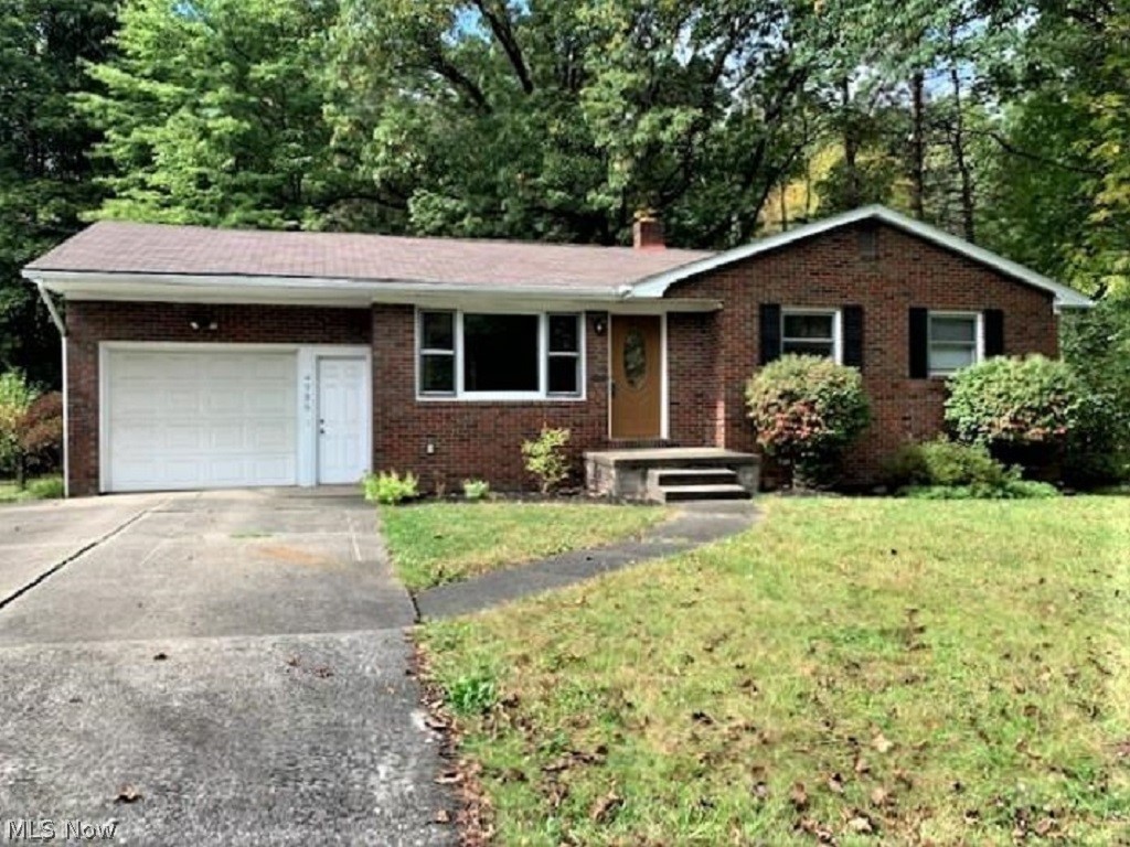 Beautiful 3 Bedrooms brick Ranch on a park like setting ! Newer carpet in the Bedrooms , Living room and Family Room, 1 1/2 Bath. The newer appliances in the kitchen stay, washer and dryer stay as well. Half of the huge basement has paneling and is ready to be completed as a rec room. Brand new Electrical service updated, 1 car garage .