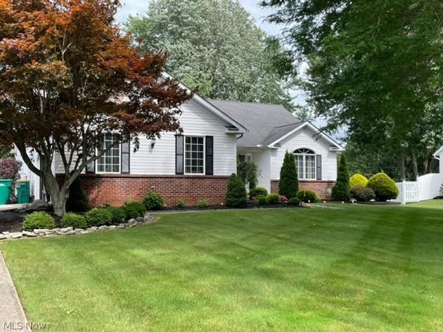 Split bedroom ranch style w/open floor plan. Kitchen w/dining area & granite countertops. Living room w/fireplace. Three bedrooms, primary bedroom has en suite with soaking tub. Laundry room on first floor! The basement has a huge, finished area for rec room, media room, etc. There's also a full bath in basement. Unfinished areas for mechanicals and storage, too! The back yard offers a deck overlooking manicured lawn. There are two storage sheds for lawn equipment, etc.  Pavlisin built in 1998. This home has been well maintained and it shows! Located near Blackbrook Golf Course.