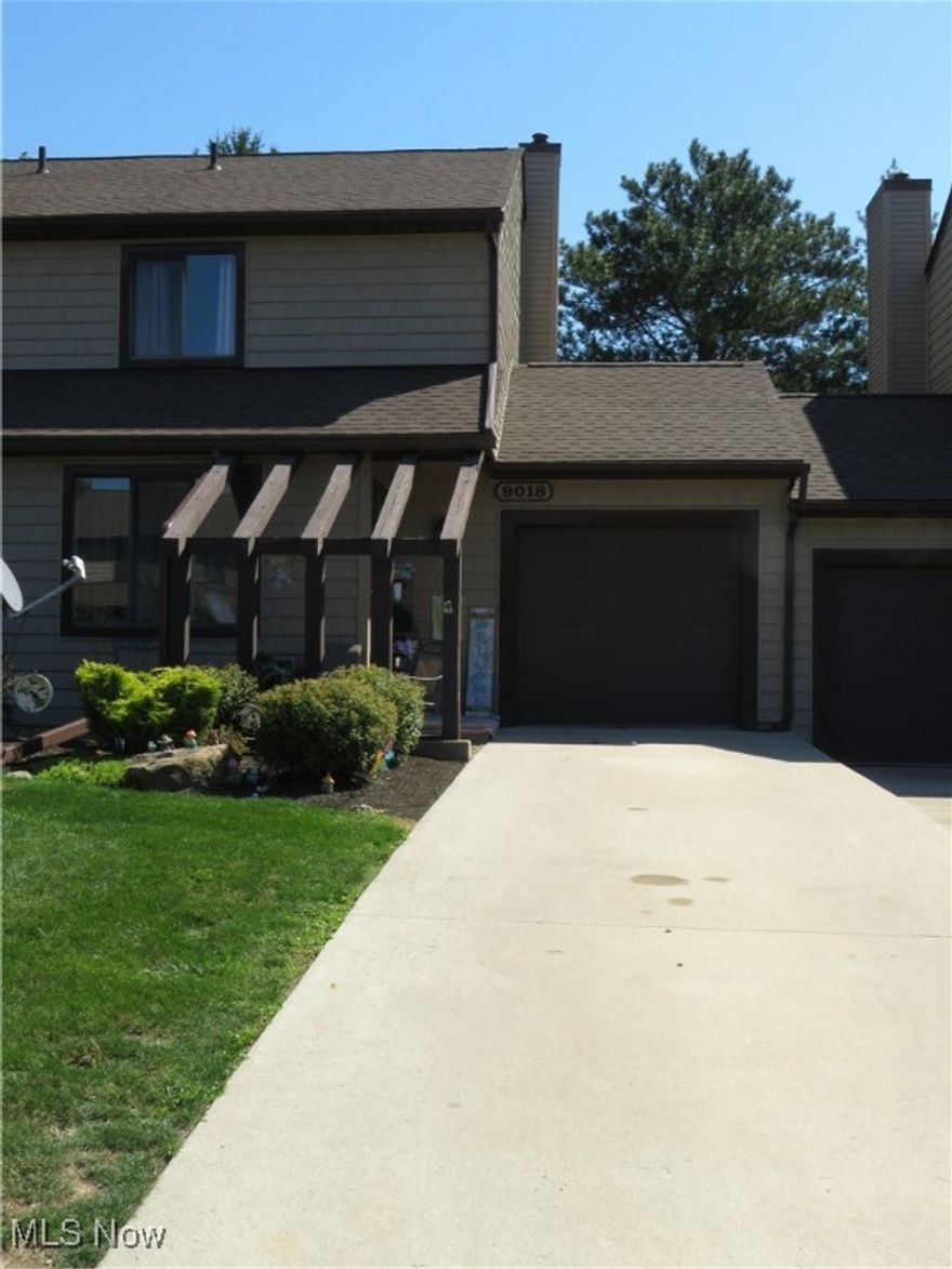 If you're looking for low maintenance living, look no further than 9018 Patriot Dr. With so much taken care of by the HOA, this is the perfect place for those looking to live a little simpler with less to manage on the outside. This well loved and managed condo is ready for new owners to move right in! Paint has been touched up and carpets have been cleaned. The main floor offers a generous sized living room, a kitchen and half bath. On the second floor you will find the two spacious bedrooms and the full bath. The basement was recently partially finished to add more living space, perfect for a bonus bedroom, playroom, rec room or office. The possibilities are endless.  You will also find the laundry room and extra storage space in the basement.   Centrally located in Streetsboro, you have access to St Rt 43, St Rt 14, St Rt 303, I-480 and the turnpike. Set up your private showing to see what this gem has to offer you!