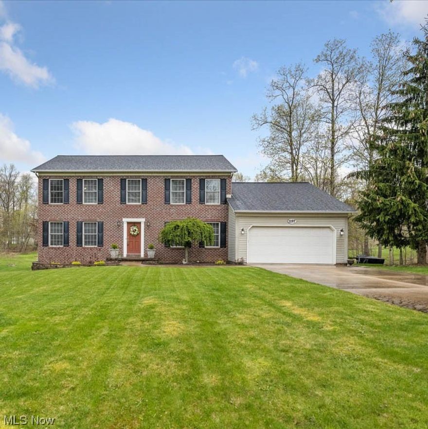 Spectacular 1 owner colonial in Nordonia schools! The spacious interior was made for entertaining w/ its oversized living room complete w/ a gas fireplace & newer laminate flooring that flows seamlessly throughout the main level. Stay connected w/ friends & family while preparing meals in the fully applianced kitchen w/ gorgeous hickory cabinetry, center island w/ counter seating & space for casual dining. A patio door opens to a cozy screened porch w/ a wood plank ceiling & easy access to the deck & nice-sized backyard.  Off the kitchen are a guest bath, 1st-floor laundry, & mudroom entry from the attached 2 car garage that add convenience to everyday living. A designated home office w/ French doors for privacy is a real bonus when working from home! Upstairs, are 4 bedrooms & 2 full baths. The master retreat offers an en suite bath w/ a double sink vanity, a tub with shower surround & a walk-in closet w/ the secondary bedrooms having access to the lovely full bath off the hall. Even