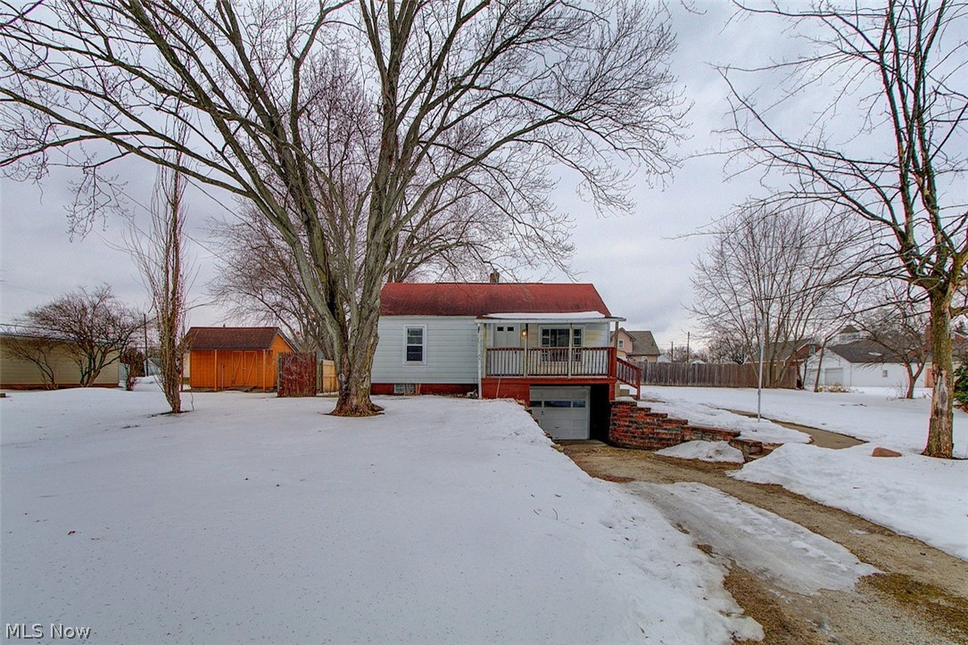Updates are complete and we are Back on the market!!
Welcome home to 209 28th St SW located in Canton South. This humble and adorable bungalow is ready for a new owner and is move in ready. Great home for a first time home buyer. Updates include Fresh paint throughout, new bathroom vanity, new bathroom accessories kit, new carpet in first floor(bedrooms hallway and living room) new lights, new public water service was added in 2021, new kitchen sink, countertop, added a backsplash, new chair rail in kitchen. The second floor has one bedroom with a bonus room that can be used as a media room or additional bedroom. The covered front porch overlooks the huge front yard. There is also access to a raised back deck off the kitchen, where you can put a grill, a few chairs and table where you can relax and have morning coffee. Has a side lot in the back outside the partially fenced in backyard. There are two convenient nice sized bedrooms on the first floor and a first floor bath. Includes a