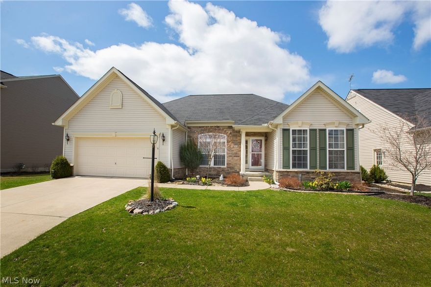 Prepare to be Moved!...Into this fabulous ranch in North Ridgeville! This stunning home is the perfect size to start out or retire in! Step into the open great room with stone fireplace and enjoy watching sunsets over the pond. You'll fall in love with the open floor plan with large kitchen boasting double ovens, countertop range and loads of counter space. All appliances stay! Breakfast room overlooks pond with access to back patio. In addition, there is space for a formal dining or office. French doors lead to the 3 bedrooms. The master bedroom has a beautifully remodeled bath with granite countertops, walk-in tiled shower and newer toilet, sinks & linen closet (2016). Two additional bedrooms share a full bath. Basement has been updated to include fitness room and full bath (2017). Outside, you'll love relaxing on the custom designed stone deck with mature trees providing privacy and beautifully landscaped yard overlooking the pond where you can fish and knack. HOA includes mowing by