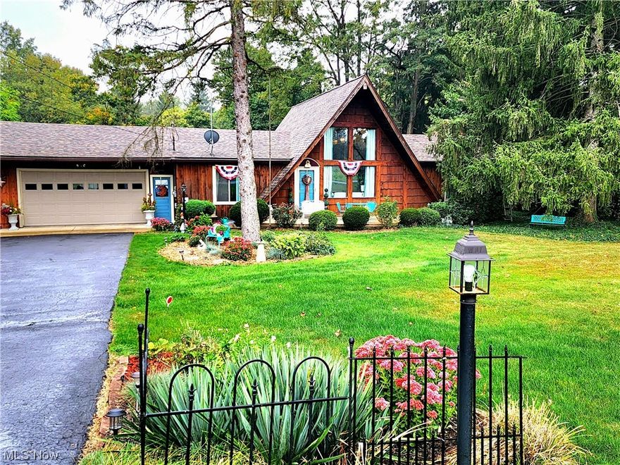 Check out this unique, ranch-style A-frame on over an acre, in a beautiful country setting! Impress guests with the backyard oasis of
flourishing gardens and landscaping, along with a stamped concrete patio and deck. Inside, you'll find 3 bedrooms and a spiral
staircase to a loft, which could be utilized as an office or bonus space. The vaulted two-story windows allow an abundance of natural
light. The finished walk-out basement features an entire additional living space with a full kitchen, bathroom, bedroom and family
room. This home is overflowing with charm and character, and has been lovingly updated and cared for throughout the years.
Updates include roof (2018), Central Air (2021), electrical panel (2019), carpet (2022) and much more!! Don't miss out!