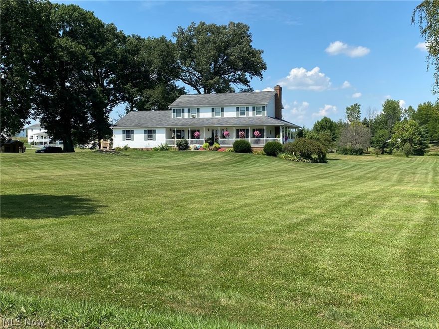 Open for Inspection: Wednesday September 9th from 4:00 to 6:00 PM. Onsite Auction Monday, Sept. 9th, 4-6:00 PM.
Looking for a home in the country with a bit of extra elbow room? This property has plenty of it with 5 bedrooms, 4 bathrooms, wrap-around porch and deck, all on a spacious lot of 3.7 acres. Inside you will love the open floor plan for entertaining. The kitchen features custom oak cabinetry, island, and hardwood floor along with a formal dining room. Also, on the first floor is a cozy living room with gas fireplace, an office area, large laundry room, and full bath. Upstairs, you will find 3 additional bedrooms along with roomy master suite with walk-in closet, jetted tub, and tile flooring. The walk-out basement provides lots of extra space with additional 5th bedroom, rec room, exercise room, plus a half bath that is plumbed for a shower. The 2-car attached garage completes the home. The lot slopes gently away from the home, has ample space for a garden and has several mat