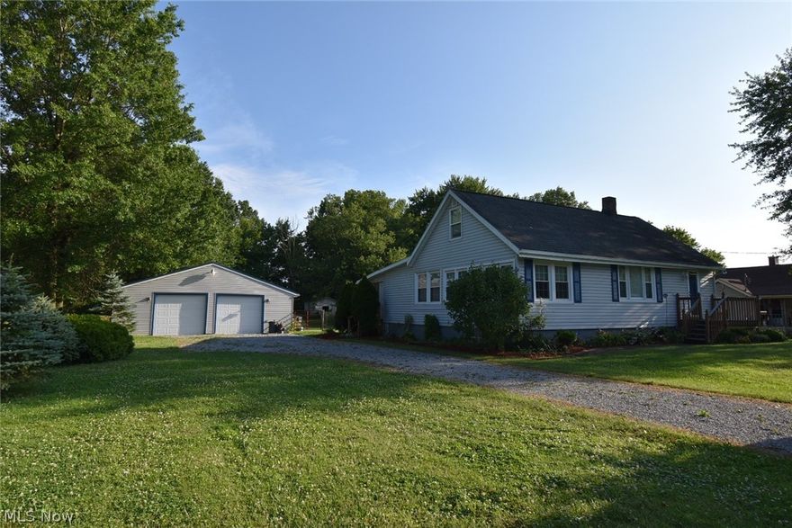 Cute cape cod home with country living on 1 acre of land in West Branch Schools. Large open kitchen with island, living room, foyer, office & a  Master bedroom & bath located on 1st floor, full basement, A 40x32 detached garage with room for your vehicles & more!! Call today for your appointment to view!