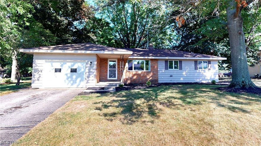 If you have been searching for single-floor living with a large, peaceful yard, than your search is over! The pride of ownership is evident the minute that you step into this wonderful three bedroom, two full bathroom ranch home. The large living room, offering brand new carpet and padding seamlessly flows into the dining room with large sliding glass door overlooking the deck in the large backyard of the home.  Newer appliances are included in the kitchen and one of the full bathrooms has been completely remodeled (2024) and offers an accessible shower. To the other side of the home are the three large bedrooms, all with beautiful hardwood floors and another full bathroom.  The full basement is unfinished and offers unlimited possibilities for flex space, recreation, or storage. This home offers an updated electrical panel (2022), newer roof (2020), new carpet in living room (2024), updated flooring, and newer fixtures throughout, plus a large pantry was added to the kitchen a few years back. All of this on an amazing 0.56 acre wooded property that is great for outdoor entertaining. A one-year home warranty is included for the new buyer as well. Call to set up your showing before it's too late.