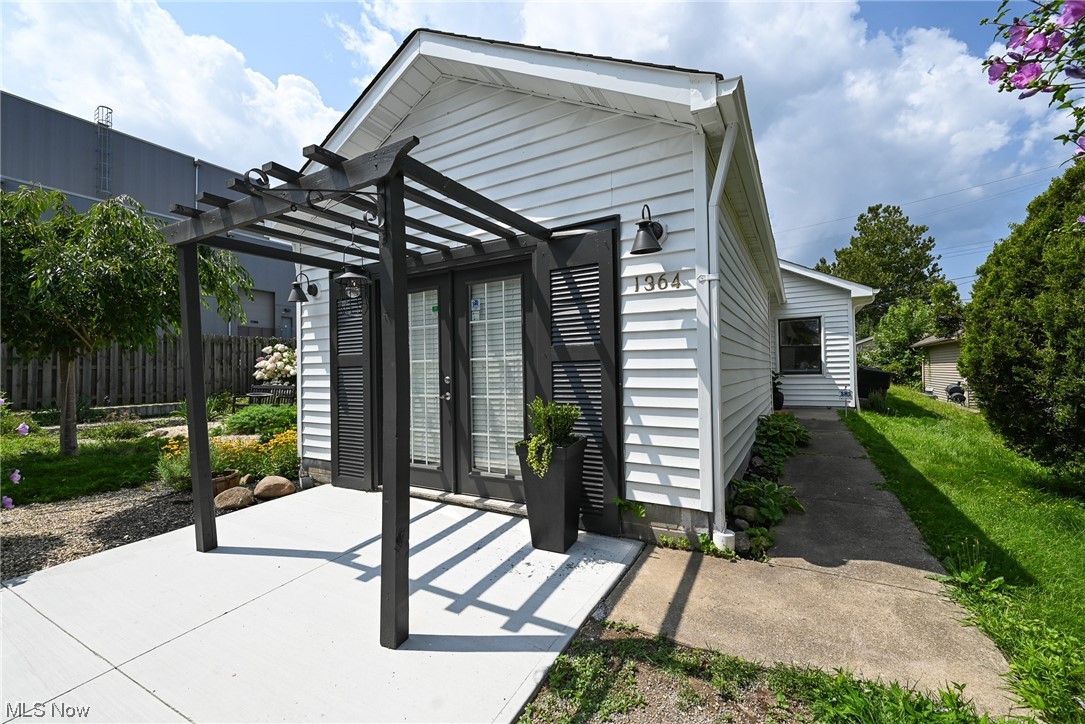 An absolute gem in the highly desirable Detroit-Shoreway/Gordon Sq Arts District! This 3 bed 1.5 bath ranch is a rare find! Gorgeous green space/landscaping with a fully fenced in large yard. Enter and be greeted by warm/airy living space highlighted by the vaulted ceilings with wood beams, modern light fixtures, and new flooring throughout. Cozy dining nook right off the completely remodeled kitchen ! Kitchen updates includes shaker cabinetry, Qaurtz counters, stainless steel appliances with vent hood, tiled backsplash, modern open shelving, and coffee bar with shelving and storage. Elegant and bright master bath transformation includes, hex tile floor, new vanity, fixtures, and tiled bath. Three full sized bedrooms, with one including half bath and back exist to garden atrium enclosed 8x8 plus stone patio 15x10. Laundry hookups and closet space in the hall. Wrap around L shaped yard, fully fenced in, provides rare privacy in this area. Bring your ideas to the converted 1 car garage/f