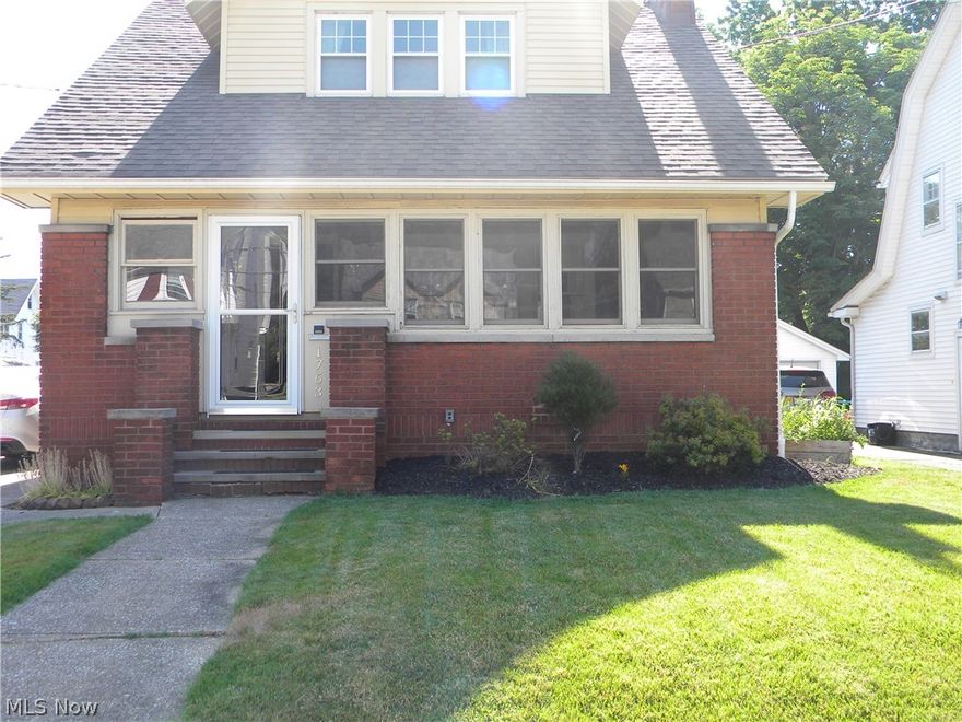 Beautiful 3 bedrooms 2.5 bath colonial in the heart of Cuyahoga Fall. Walk into a large enclosed front porch where you can enjoy your morning coffee.  Large living room off sets the dining room.  Kitchen features new cabinets and countertops.  Bedrooms with large closet space.  Finished full basement with new carpet and a full bathroom for entertaining.  Backyard includes deck, patio, hot tub, small pond, and a large yard.  Home Warranty included.  Don't miss this opportunity.