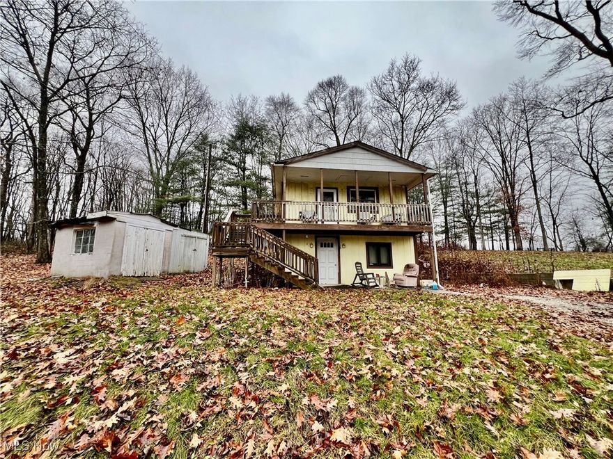 Charming Cottage at Vo Ash Lake, Ready for Your Personal Touch! Nestled on 3.5 spacious lots on a dead end in the serene community of Vo Ash Lake, this cottage is bursting with potential and waiting for its next chapter. Whether you're dreaming of a weekend getaway, or a cozy year-round home, this property is ready to be transformed into your ideal retreat. Be captivated by the peaceful surroundings. With ample outdoor space spanning 3.5 lots, there's plenty of room to create your dream garden, add a deck for entertaining, or simply relax and enjoy the fresh air. Vo Ash Lake offers a tranquil setting with natural beauty, perfect for outdoor enthusiasts, fishing, or simply unwinding. This property provides a unique opportunity to make your mark and create a home that reflects your personal style. Key Features: Located on 3.5 lots for extra privacy and outdoor space Endless potential to update and customize Close to the beautiful Vo Ash Lake, Leesville Lake, MWCD and outdoor activities. Ideal for a primary residence, or vacation home. Bring your vision and transform this cottage into the perfect escape. Schedule your tour today and start imagining the possibilities! No Short term rentals. Auditor indicates 1 full bath and 1 half bath, but Seller states 2 full baths.