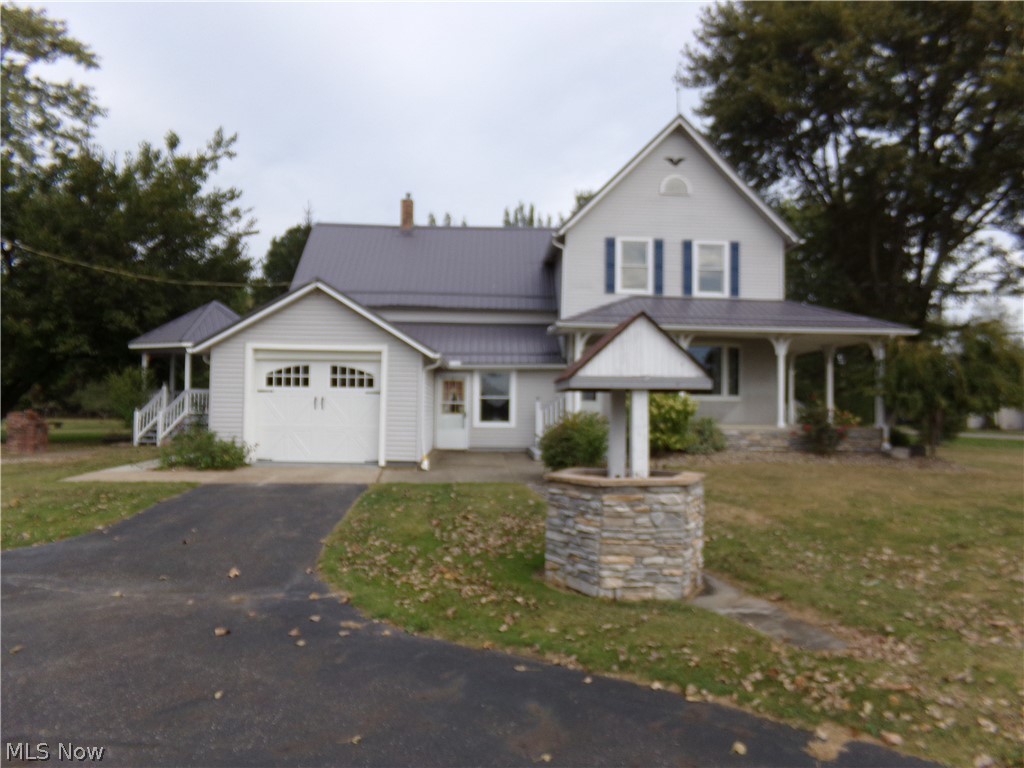 Welcome to 8991 Bender Rd. Do you want to own a piece of the country but also enjoy city conveniences? Then this
home is for you! Come see this 4/5 Bd. Colonial built in 1909 & situated on approx. 5 acres with lots of trees. Many
features include 1st floor Master Bd & bath, large eat in kitchen with stainless steel appliances, oak raised panel
cabinetry, newer wood look ceramic tile floor, off the kitchen is a room set up as a laundry room but was used as an
office, updated 1/2 bath & large closet off the hall. Go down a few steps & there is a larger laundry room, closet &
cabinets. Door off laundry leads to the garage which has ceramic tiled walls, water, electric, drain & newer garage door
& opener. 6 & 9 inch original oak baseboards in most of the home. Upstairs is 3 bd., another room & full bath. Newer
metal roof, furnace, air & hot water tank. 10x 20 milk house with newer siding & metal roof for storage. 30x 40 barn
that could house 2 cars, concrete pad 20x24, water, 2 hor