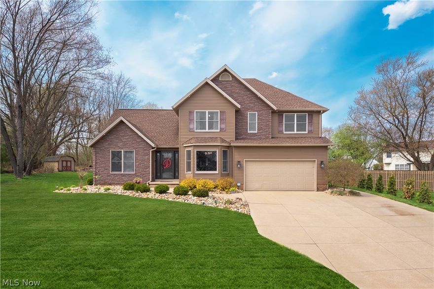 Welcome to this thoughtfully updated home located in the community of Olde Orchard Estates. The front of this home serves ample curb appeal w/ crisp landscaping, sharp 4 point roofline, stone accents, & extra large driveway. The foyer greets guests w/ wide plank grey flooring, vaulted ceilings, & wide open entry to the main living area. The living room is inviting w/  a fireplace, large windows, plush grey carpet, & continues the soaring vaulted ceilings. The kitchen is fully equipped w/ ample cabinetry, glass tile backsplash, large appliances, & a casual dining space that overlooks the backyard. The main floor also includes a powder room, a forward facing dedicated den space, & spacious laundry room w/ easy access outside. The massive master suite is an easy place to call home w/ more than enough space for a king size bedroom set. This space has an en-suite master bathroom w/ 2 separate vanities, large shower/tub combo, and sleek grey tiled floor. Additional 2 bedrooms are equally as spacious & full of natural light. The basement serves as a wonderful area to entertain friends & family & can be used as a screening room, gym space, play room, or even as a rec room. The fully fenced in backyard space is truly the gem of this property w/ a huge stamped patio, in ground pool, pool house w/ full bar, and basketball court. Even with all of these amenities there is still a large grassy lawn to the rear of the pool & a separately fenced in side yard.