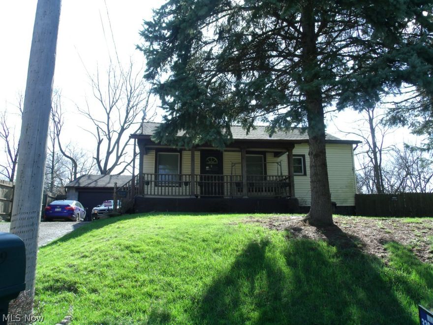 Looking for an updated ranch on private lot, this could be your home! Newer flooring, mechanics & roof. Private lot that overlooks the park that includes two additional lots. Amazing, huge 4 car garage w/workshop & that can accommodate many "man toys". Fenced-in yard. Motivated seller!