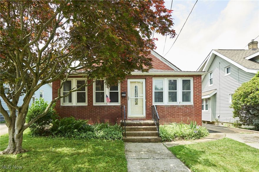 Welcome home to this delightful brick Cape Cod nestled in the heart of Barberton! Offering 4 spacious bedrooms and 2 full bathrooms, this lovingly maintained home blends classic charm with modern updates. Step inside to find beautifully refinished hardwood floors, fresh interior paint, and tasteful updates to the kitchen and bath. The enclosed front porch is perfect for relaxing year-round, while the full basement and oversized one-car garage offer excellent storage. Major mechanicals have been updated for peace of mind, including a new furnace and A/C in 2021 and a hot water tank in 2019. Situated on a quiet, tree-lined street with easy access to local parks, restaurants, and highways, this home is as convenient as it is charming. A true gem—don't miss your chance to make it yours!