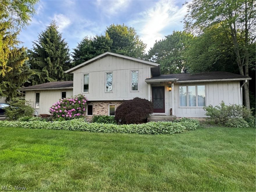 Welcome to your move-in ready home located in the highly desirable Lake Local School district.  Enter through the front door of this charming home to your cozy living room perfect for everyday living and entertaining guests. The living room and eat in kitchen feature wood floors adding warmth and character to the space.  With ample space for a dining table, you can enjoy meals with family and friends right in the heart of your home.  The kitchen is equipped with range, refrigerator and dishwasher, making meal preparation and cleanup a breeze.  Upstairs boasts three spacious bedrooms, providing ample space for you and your family.  The Natural light that fills the rooms creates a warm and inviting ambiance.  Whether you need a dedicated space for work, space for your growing family, or simply need extra space for guests, these 3 bedrooms ensure that everyone has their own private haven within the home.   This beautiful home features 2 full bathrooms for the convenience and comfort for you and your family.  The oversized lower level is a great area for entertaining and includes one of the full size bathrooms. The backyard is serene and your private oasis surrounded by mature trees.  The spacious deck is perfect for relaxation and outdoor entertainment. The deck offers ample room for hosting gatherings or simply enjoying the peaceful ambiance of nature. 
There is a shed providing convenience storage space for gardening tools, outdoor furniture or other belongings. To ensure a secluded and safe sanctuary for your pets and/or children there is a fence that covers most of the backyard. Don't miss the opportunity to make this home yours, schedule your private showing today.