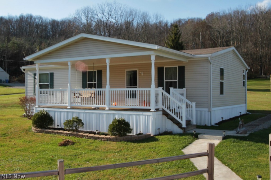 This Very well maintained one owner home offers you 3 spacious bedroom , 2 full baths , spacious eat in kitchen , large laundry room off the kitchen . Sprawling front covered porch . Back deck overlooking country like setting . Shared driveway . This home sits on .90 acres . West Muskingum School District. Property has already been inspected by Licensed Engineer . Property does meet HUD Guidelines for Manufacturing Housing . New legal description was performed . Taxes TBD .