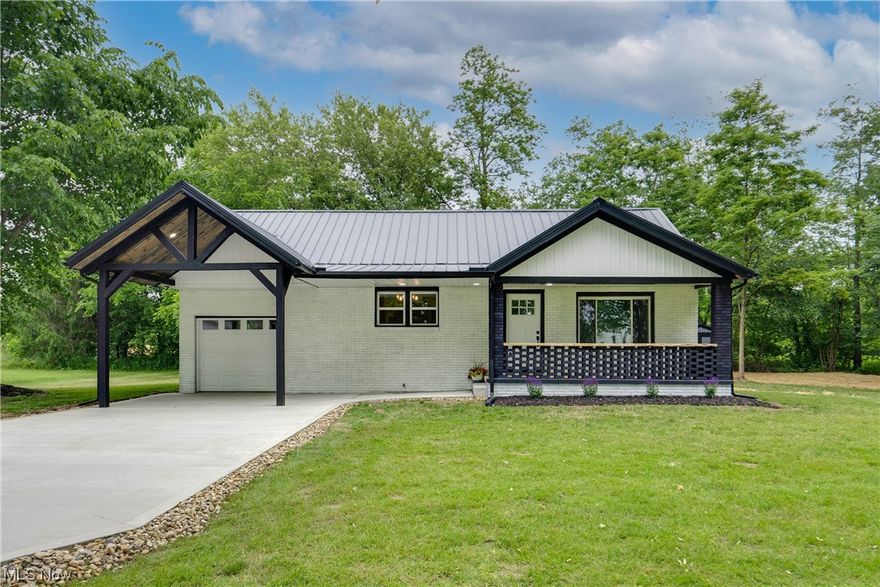 Welcome to 8613 Mapleton St SE in East Canton, where charm meets modern convenience. This beautifully renovated 3-bedroom, 1-bath brick home is ready to impress. Step inside and be greeted by a fresh and inviting interior. No detail has been overlooked in this complete renovation, which includes a new roof, windows, and a modernized kitchen with stunning granite counters and a farmhouse sink. The attention to detail shines through, creating a stylish and functional space. A new concrete driveway adds both convenience and curb appeal. The garage is a standout feature, boasting an overhead door at the back, allowing for easy storage or creating a versatile entertaining space. To further enhance your comfort, a new AC system, ensuring a cool and pleasant environment.  Brand new septic system as well! This home is truly move-in ready, offering a stress-free transition. Situated on just under 2 acres, this property offers a serene and picturesque setting. The presence of a creek adds a touch of tranquility, making it a haven for nature lovers. Don't miss the opportunity to own this beautifully renovated home on a spacious lot in East Canton. Schedule a showing today and experience the perfect blend of modern upgrades and natural surroundings.