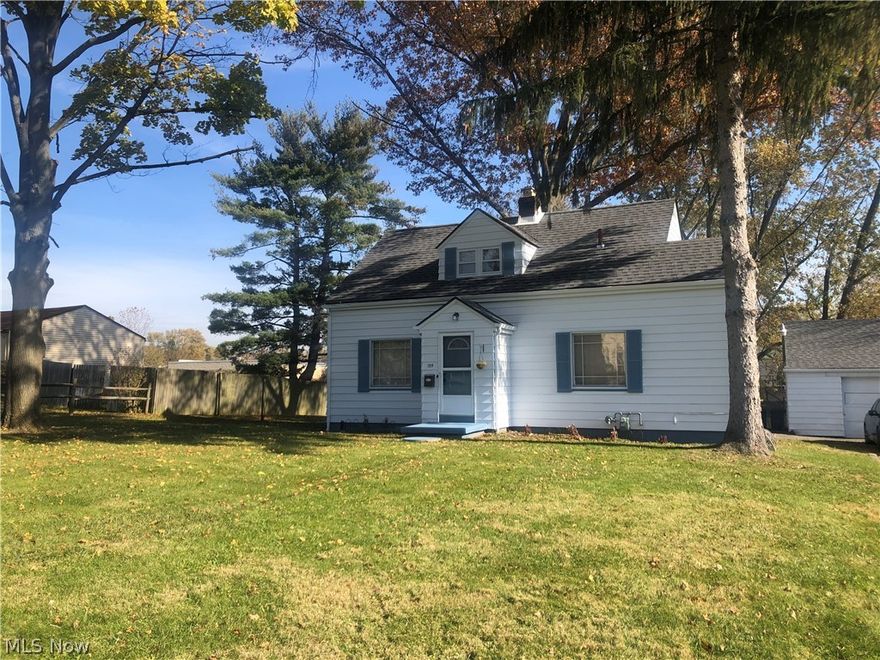 Lovely 4 BR Cape Cod on a double lot. This home features a band new kitchen with gorgeous tiled back-splash, new cabinets, custom cut counter tops and  laminate   flooring, opens into the large living-room. Updated bathroom with new title, updated vanity, plenty of storage. Brand new Capet in the first floor bedrooms. Upstairs  features 2 generous bedrooms and sitting a sitting area perfect for office or play room.  Tons of charm and character through-out. Oversized two car garage perfect for additional storage. House exterior was painted and new roof installed in October 2021