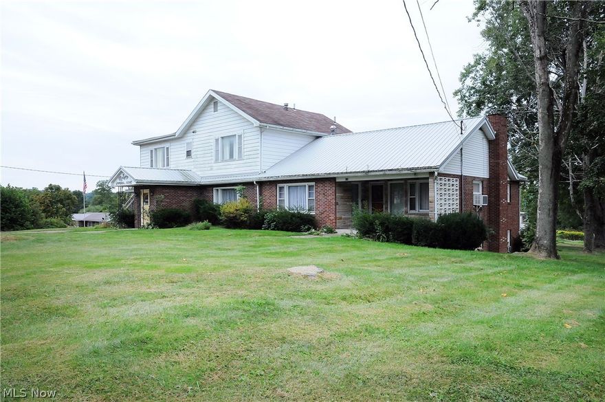 Sitting on 4.338 on a prime location at the corner of Main St and Fairground Rd in Caldwell. Property was most recently used as a funeral home, but is well suited for a number of commercial purposes. Large paved parking area and 3 car garage. 3 room apartment above funeral home and additional residence also located on property.