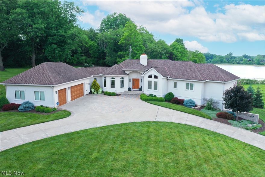 Welcome to 3046 Silver Lake Blvd, a magnificent 4-bedroom, 3.5-bathroom custom-built ranch home situated on a sprawling 1.63-acre lot with silver lake privileges. Built in 2010, this 3,644 sq ft residence offers an unparalleled blend of modern luxury and serene natural beauty. Enjoy the breathtaking views of Crystal Lake from the back and Silver Lake from the front. Neutral décor throughout complimented by hickory trim, cabinets, custom tinted windows & doors. Two of the bedrooms would be perfect for a work-at-home office as well. The kitchen is a chef’s dream with hickory cabinets and sleek black granite countertops. The brightly sunlit breakfast nook and great room both have a wall of windows offering a view of the grounds and Crystal Lake. The master suite bathroom has been beautifully remodeled to include a giant walk-in shower, a relaxing soaking tub, heated floors, and a spacious walk-in closet with an attached laundry room and cedar closet providing a spa-like retreat. The fully finished walk-out basement with full windows and lots of natural light offers additional living space, perfect for entertainment. Walk out to your outdoor oasis with a stone patio, custom firepit, and a hot tub with beautiful crystal lake views and sunsets. The three-car heated garage features epoxy-finished floors and a dedicated gardening room. Nestled in a tranquil setting, yet conveniently located with easy access to local amenities, this home offers the best of both worlds. Don’t miss your chance to own this exceptional property that combines luxury, comfort, and natural beauty. Schedule your private tour today and experience all that 3046 Silver Lake Blvd has to offer!