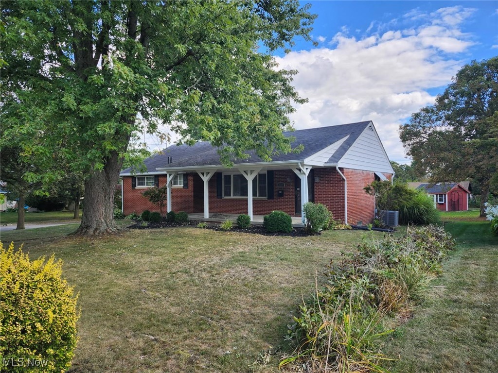 Beautifully redone brick ranch, in a quiet established neighborhood! New furnace and central AC, refinished hardwood floors, new kitchen with quartz counter tops and finished basement. Completely redone master bathroom!