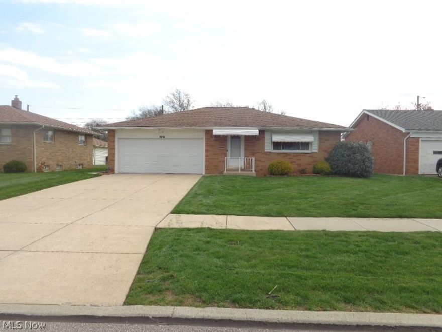 Move In Ready Brick Ranch On A Quiet Street!! Two Car Attached Garage!! New Furnace-Central Air-H2O Tank Aug 2025!! Garage Door 2 Years Old!! 2 Year Old Patio Door Off Family Room Leads To Covered Patio!! Awning Over Patio Is Approx 4 years Old 4 Inch Thick And Insulated!! Replacement Windows!! Glass Block Bsmnt Windows!! Pergo Floors Living Room And Dining Room!! Nature Stone Garage Floor!! Privacy Rear Yard Fence!! Home Is Priced To Sell-Wont Last!!