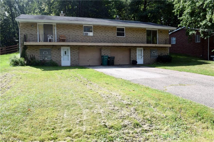 All  brick Townhouse style 2 unit with attached garage and wooded lot.  First floor laundry/utility room.  Quiet cul-de-sac. Near bus lines. Long term tenants, great investment property. Located just east of Rt 8, south of Ohio Turnpike and seconds from Rt 91/Darrow Rd for easy commuter access.