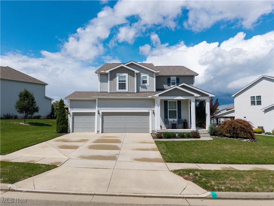 Welcome to this stunning Pulte-built home in the desirable Baker’s Glen neighborhood! Meticulously cared for, this 5 bedroom, 3.5 bath home is designed for memorable gatherings. From the moment you step inside, soaring 9’ ceilings, an open floor plan, and abundant natural light make the home feel bright and inviting. The oversized 3-car garage with expanded concrete driveway opens to a spacious mudroom with built-in boot bench and walk-in coat closet, keeping life organized and clutter-free. The heart of the home is the kitchen, featuring stainless steel appliances, massive granite island with seating, and large walk-in pantry. Just off the kitchen is a planning center, an ideal spot for homework, crafts, or staying organized. The dining area flows easily to a composite deck and stamped concrete patio with gas-start firepit creating the perfect setting for evenings with friends & family. Inside, the great room invites relaxation with plush carpet and stone gas fireplace. The main floor flex room offers space for home office or hobby area. Upstairs, the spacious primary bedroom connects to an ensuite with double sinks and a generous walk-in closet. A versatile loft provides space for a second family room, playroom, or study area, giving everyone room to spread out. The family bathroom includes double sinks with separate shower and toilet area. A walk-in storage closet, laundry room, and three additional bedrooms complete the second level. The fully finished basement, completed in 2023, offers recessed lighting and an exceptional, well-designed space! It includes a 5th bedroom with an egress window and generous walk-in closet, full bath, spacious family room, workout area, and play area. A separate storage room provides additional convenience. The home is surrounded by walking trails, a pond, and is also close to nearby parks and hiking trails. Easy access to shopping, restaurants, Kent State, and major highways make this location convenient and appealing!