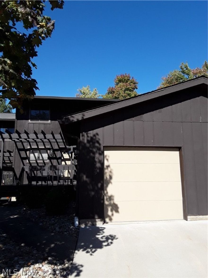 Nicely updated and well-maintained, 3 bedroom, 2 full bath townhouse style condo with full finished basement on a wooded cul-de-sac lot! Kitchen, bathrooms, flooring, painting, appliances, lighting, plumbing fixtures & finished basement has all been updated in the past 4 years! Dining room is open to the living room with patio doors that lead out to a large deck. Convenient location close to shopping, dining, medical & recreation centers. Easy to show & quick occupancy.