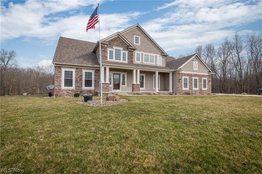 Wow! This gorgeous 4 bedroom 4.5 bathroom home on 10+ acres is a MUST SEE! You'll love the open floor plan with wood floors, high ceilings, and plenty of bright, natural light throughout. Step into the inviting two-story foyer. The formal dining room sits just off of the foyer with a tray ceiling and an open wine bar. The perfect place to relax is in the living room, next to the fireplace, in front of the large cathedral windows with peaceful views of the woods. You'll enjoy preparing your favorite meals in the quality chef's kitchen featuring granite countertops, dark wood cabinets, stainless steel appliances and a large island with a breakfast bar. The stunning first-floor master suite is complete with a large walk-in closet and private full bathroom featuring a walk-in shower, garden tub, and powder room. There is a 2nd bedroom on the first floor plus a convenient first-floor laundry room and half bath. Make your way up to the second floor featuring a jr. suite with a walk-in closet