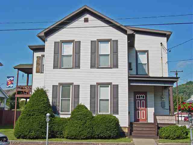 Great investment opportunity in Wellsburg. Bottom floor is rented to a business, top floor is a 1 BR apt. - both with long term lessees. Many updates. A good value for a 100% leased property in the heart of town.