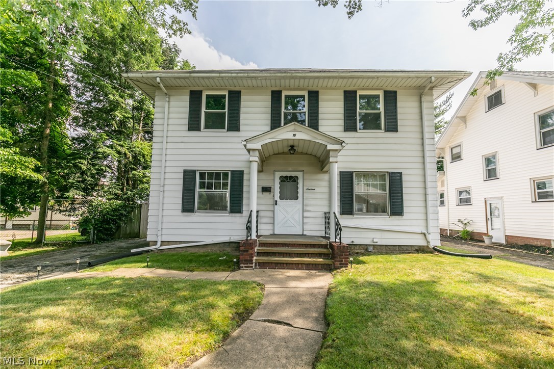 Welcome to this lovely Colonial home in North Akron! This home is filled with so much charm from the hardwood trim throughout, original doors, chair rails and built-ins! Take a look at the family room that has a ton of natural light from all the windows, and also do not miss that darling built-in next to the fireplace! Next to the family room is an additional room that would make for a perfect play room or office space. The dining room has a lovely chair rail and stunning original door that opens into the kitchen. Kitchen has nice white cupboards and an adorable sitting area surrounded by windows, where you can enjoy a cup of coffee and watch the sunrise! Three nicely sized bedrooms, and two baths. Basement is partially finished which would make a nice rec room. A pleasing backyard plus the additional parcel for extra outdoor space!