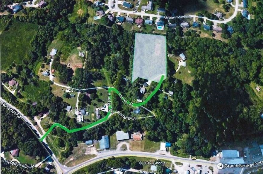 2.87 ACRES, backs up to Greenmont Subdivision. Property borders Greenmont but no access road to Greenmont. Utilities available but not on property. Property located outside of city limits. See Survey on paperclip.