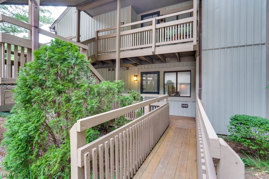 Welcome home to 558 Meredith Lane!  Located minutes from the Cuyahoga Valley National Park, this 2 bedroom, 1 1/2 bath home offers many recent upgrades.  These include granite countertops (kitchen), French doors (sunroom), upgraded dishwasher, fridge, microwave, stove, washer, and dryer.  Cozy up in to the gas fireplace.  Enjoy the bonus sunroom off the dining room that can be used as an office space or additional entertainment area.  Dine out on the partially covered deck that overlooks the woods.  The property provides access to an outdoor pool (seasonally). Home is situated among a small, 30-unit condo community that is quiet and peaceful. This particular unit is a ranch style (single floor) on the ground floor so the buyer will not need to use stairs to move into or access the property. This unit is also located in the very back of the property which overlooks acres of woods, providing more privacy than is typical for a condo. Deer, birds, and other wildlife frequent the property.