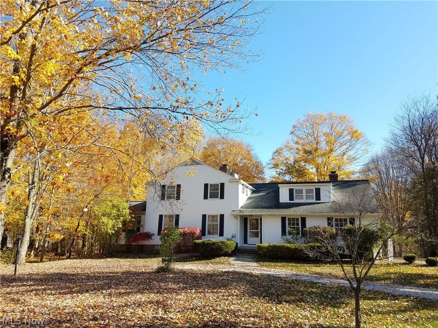 Incredible opportunity in Gates Mills!  This 3500+ square foot colonial is situated on almost 4 park-like acres on the Chagrin River!  The formal living room and dining room boast beautiful maple hardwood floors and built-ins and accesses a screen porch and the first floor/study with new carpeting.  Ahead of its time when it was built, the home’s open floor plan also boasts an expansive family room with newer ceramic tile floors and wood burning fire place.  Ideal for entertaining, the family room opens to the spacious eat-in, fully applianced kitchen with bay window seat and ceramic tile. Love to cook?  There is a bonus room off the kitchen with new carpet ideal for a chef’s prep pantry or additional study/reading nook. The home has even more to offer on the second floor! Owner’s suite boasts beautiful views of the yard, 4 additional bedrooms- all with new carpet and paint- PLUS one has its own en suite bath! Closet space is abundant both in and out of the bedrooms- 2 additional walk-