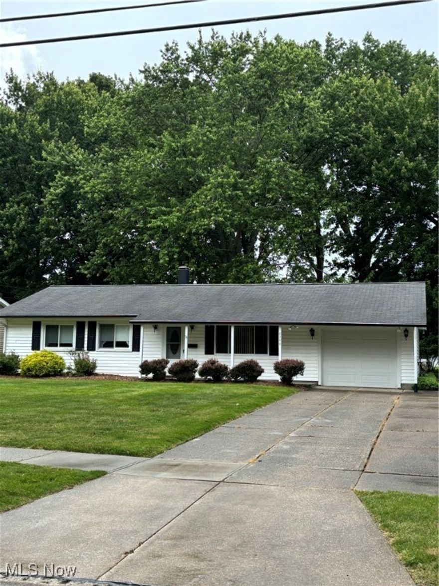 Welcome to your new home. Low-maintenance Mentor Ranch in a desirable neighborhood. 3 Bedrooms, 2 Baths, Laundry room, 3-season room, attached garage on a nice big lot. Spacious Living Room with large picture window brings in lots of natural light. Single-floor living with a smart layout. Half bath conveniently located off master bedroom. Spacious kitchen, dining area, and sliding patio door leads to a 3-season room, where you can sit and enjoy the big back yard. Has been a family home for many years. Now you can make it your own! Central vacuum in home but Seller's family never used it. Bring your decorating ideas for your very own property makeover! Appliances are included, condition of most are unknown. Built-in stove only works on high. Bathtub needs repaired/replaced.