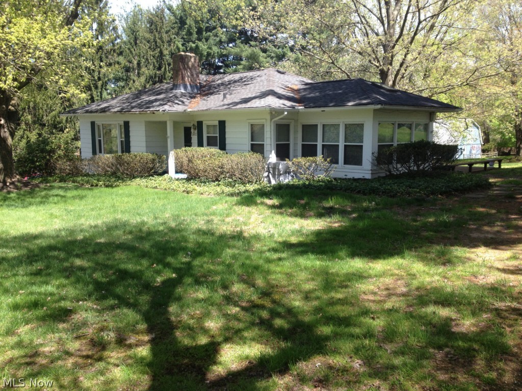 Charming Raised Ranch near it all! This single family home sits on just over a half acre. Bright and sunny eat in kitchen. Den off kitchen opens to the to the back deck. Large living room with tons of windows. Big bedrooms with lots of closet space. Finished rec room in the walk out basement could be a 3rd bedroom... One car attached garage. Washer and dryer included. Private and quiet lot. Owner takes care of mowing! This property is actually in Kent, but has Stow Monroe Falls Schools. This home has it all, a rare find!