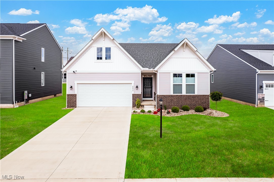 Don’t miss this rare chance to own in the sold-out Red Fern Trails community! This nearly new 2 bedroom, 2 bath ranch with a dedicated office is just 1.5 years old and offers all the perks of new construction without the wait. At the front of the home, the entrance is accented with stylish trim work to impress guests. Conveniently located at the front of the home is a generous guest bedroom that has easy access to the full bathroom. Next up is the office that offers flexibility in the floorplan as it can be used as a formal dining room or converted to a 3rd bedroom. Moving to the heart of the home, you’ll find the open concept great room featuring vaulted ceilings and a cozy gas fireplace. The stunning kitchen flows seamlessly from the great room and shows off white craftsman-style cabinetry, granite countertops, a spacious island with seating, tile backsplash, a walk-in pantry, and stainless steel appliances. A bright dinette area just off the kitchen is perfect for casual dining or entertaining guests. Sliding glass doors from the dinette lead to a quaint covered patio perfect for enjoying morning coffee. Back inside, the spacious primary suite has a large walk-in closet and ensuite bath with a tile walk-in shower, oversized vanity, and linen closet. Completing the main level is a laundry room. Downstairs, a full unfinished basement offers endless possibilities for additional living space and includes rough-ins for a future bathroom. Outside, entertain on the patio surrounded by brand-new professional landscaping. The location makes commuting effortless as the community is situated just 12 minutes to I-80, 14 minutes to I-71, 9 minutes to Southwest General Hospital and Baldwin Wallace University. It is also minutes from Columbia Township Park, Mill Stream Run Reservation, and the Lorain County Metro Parks Columbia Reservation. Come see today!