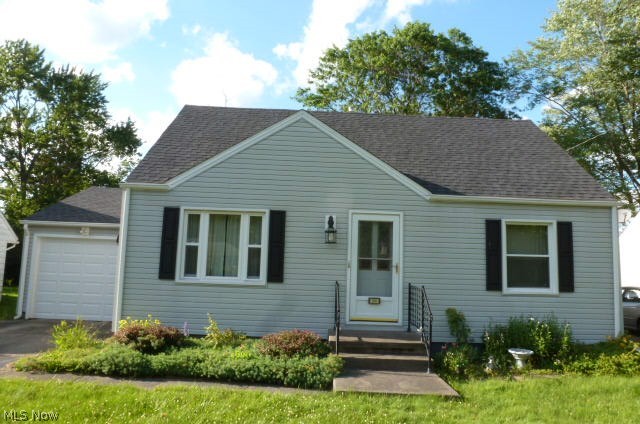 Plenty of curb appeal for this three bedroom vinyl sided Cape Cod. Attractive kitchen, spacious living room, vinyl replacement windows, full basement, attached garage all resting on an oversized lot. Updates include furnace, electric service, and roof shingles. Shows well!