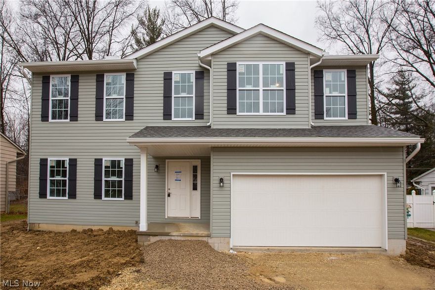 Prepare to be Moved....into this brand new Olmsted Falls home! This Wayne Homes Jamestown model has it all.  Beautiful neutral tones will blend with today's hottest decor. An open foyer greets you and leads you to a light filled kitchen with eat in dining and adjoining family room. The den, laundry and half bath finish off the first floor while the upstairs houses the master suite with three additional bedrooms. The basement has been plumbed for a 3/4 bathroom and includes an egress window for a future bedroom.  There's nothing to do here but move in!