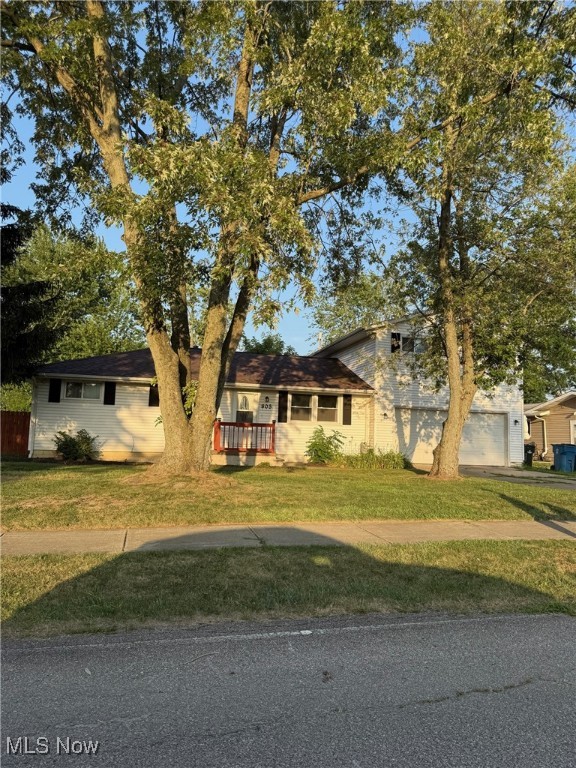 Welcome to this large FIVE bedroom, TWO full bath colonial in Sheffield Lake!! This large corner lot home sits on THREE parcels and is just two blocks from Lake Erie and the public boat launch! The extra parcel/driveway is a perfect space to park your boat or camper! Updates include: New heavyweight asphalt/fiberglass shingled roof with transferable warranty (2020), new full privacy fence (2022), new carpeting throughout the home (2023), NatureStone flooring in finished basement (2023), new basement staircase installed (2022) and storm and sanitary lines fully replaced in 2024!! Gutters professionally cleaned and whole house power washed (7/25/25). All appliances stay! Schedule your private tour today!!