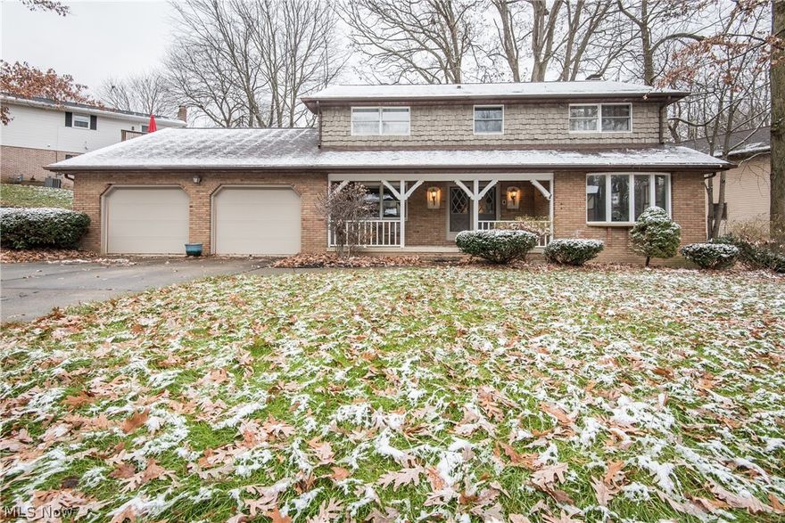 STUNNING 2 STORY IN IRISH OAKS!  This updated classic is sure to impress the moment you step inside and see the beautiful curved staircase.  Beautiful wood-like tile flooring flows from the foyer into the formal dining room with crown molding, chair railing, and convenient access to the eat-in kitchen.  The kitchen has been updated with granite countertops, shaker cabinets, stainless steel appliances, and tile backsplash, with a half bath and laundry room down the hall.  You will enjoy spending time in the 4 season sunroom with an abundance of natural lighting from the windows and skylights.  The family room offers a beamed ceiling and fireplace with two white pillars at the entrance into the formal living room with a large picture window.  A spacious master suite awaits you on the second floor with a walk-in closet and master bath with tub/shower combo and dual vanity.  The additional two bedrooms are nicely sized with easy access to the full bath with tub/shower combo.  Additional sq
