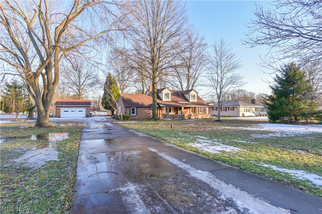 Spectacular 4 Bedroom Home with Scenic Pond, Huge 60 x 100 Pole Barn with 4 Spacious Box Stalls, Indoor Riding Arena, and plenty of room for hay storage on over 3 Acres of Land. Back Pasture is steps away from the Mindy Henning Memorial Trail in the Mill Creek Park System. Home Features Include: Large Front Living Room, Awesome Family room with Fireplace, Spacious Eat In Kitchen with a view of the pond & grounds. 2 Large Bedrooms & Full Bath. Second Floor offers 2 Bedrooms & 2nd Full Bath. Special Features include: Tons of Built - ins, Unique Antique Bookcases from a church in Zanesville, Wainscoting crafted from church pews, and antique fireplace mantel. The Backyard Paradise plays home to Deer, Ducks, Geese, Herons, Rabbits and a variety of singing birds. Updates Include: New Roof - 2000, New Furnace - 2017, & New AC - 2017. Well & Septic have already been completed and passed. This Scenic Paradise if Available Immediately.