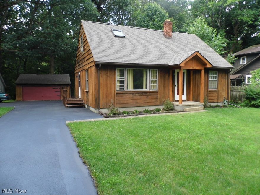 This is the home you've been waiting for! 4 bedrooms and 3 bathrooms (one on each level) and 2 separate garages (a 3 car garage and a 2 car garage) backing up to the Gorge Park for the beautiful view of the woods! Fully remodeled with refinished hardwood throughout and new kitchen and bath floors. New Stainless Steel appliances (Microwave, stove and dishwasher). This was a loving family home looking for a new family to call home! Well kept and recently updated throughout. Partially finished basement level offers plenty of storage, workshop area, recreation room, laundry and bathroom. Many updates and upgrades including electrical, furnace, paint, flooring, lighting, etc.Driveway was just resealed with plenty of parking. Car lovers dream or recreational vehicles or storage with 5 bays of garage!  Come see for yourself! Call today for a private showing!