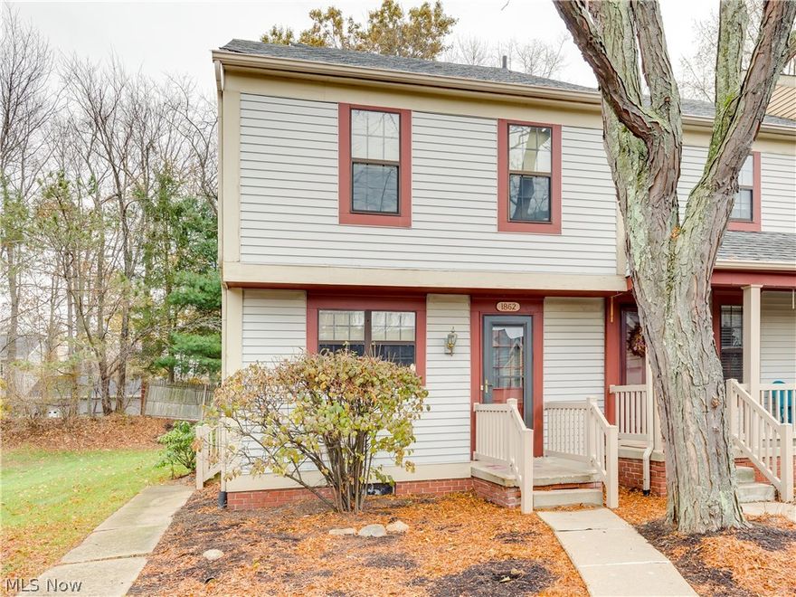 This wonderful end unit condo has all the conveniences and maintenance free living! There are three levels of living and a beautiful open floor plan. The living room has a beamed ceiling, a gas fireplace and sliding doors leading to a nice private deck overlooking the backyard. Half bath on first floor. The finished lower level has recreation space with a bar and storage. One car detached garage.