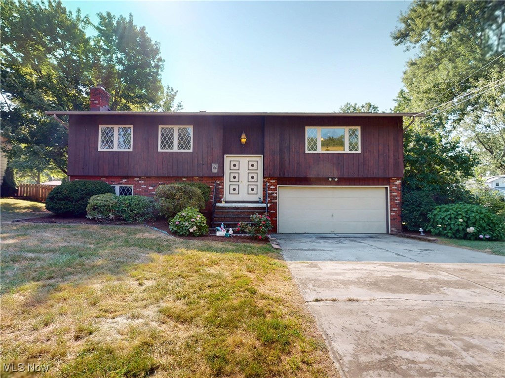 Nestled in the heart of Mentor within the highly sought-after Hopkins Elementary district, this spacious split-level home offers an ideal combination of comfort, functionality, and potential. The partially fenced yard provides privacy and outdoor enjoyment, complete with a 10x12 storage shed, a deck for entertaining, and a lower-level patio perfect for relaxing or hosting gatherings. The lower level features a versatile bedroom, a full bath, a convenient laundry area, and a cozy electric fireplace, creating a warm and inviting space for guests or multigenerational living. On the main level, an abundance of natural light fills the bright living room, which flows seamlessly into the large eat-in kitchen and formal dining room, making everyday living and entertaining effortless. Upstairs, three generously sized bedrooms, including a primary suite with its own full bath, offer comfort and privacy for the whole family. With all major components from 2009 or newer, this home is built to last and provides a solid foundation for your personal vision. With a little imagination, it can be transformed into a true showplace, offering both ample living space and endless possibilities for creating the home of your dreams .
