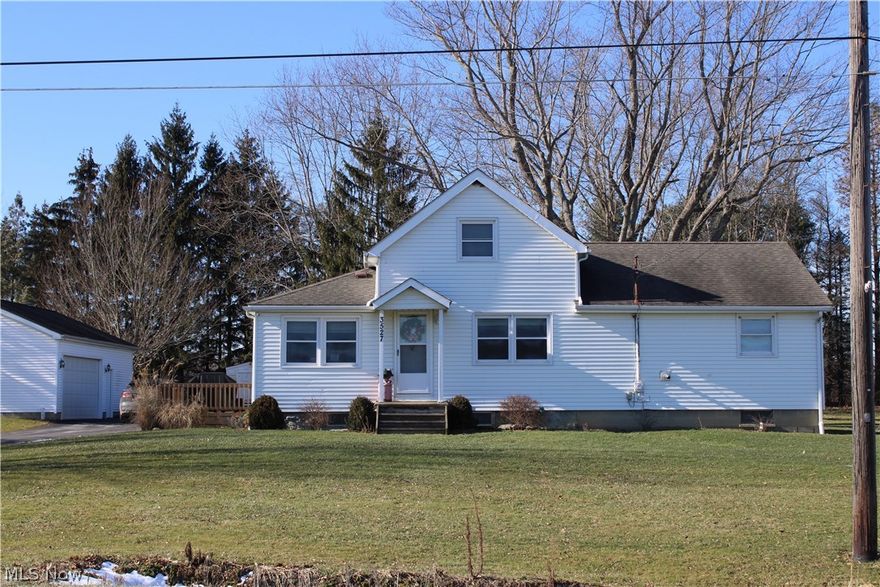 If you watch the design shows on TV you know the Farmhouse look is a big trend.  This adorable farmhouse sits on more than six acres, has its own pond, and is almost completely updated. A paved drive was added in 2017 and resealed last year.  The kitchen remodel was done in 2020 and has quartz stone countertops, newer grey cabin cabinets, and newer appliances all of which stay including the washer and dryer.  These owners removed a wall for an open concept that lets in loads of light. Engineered hardwood flooring gives a wonderful look throughout most of the first floor. New carpeting was added in 2021. New tile flooring and vanity in the bathroom were added in 2013 and the tub resurfaced last year. Upstairs is a large master bedroom.  There is space up here to add a second bath over the first-floor bath if a new buyer wishes to do so.  These owners also added a pellet-burning stove and set it in a bricked corner for a cozy atmosphere. A deck leads to the mudroom which of course all fa