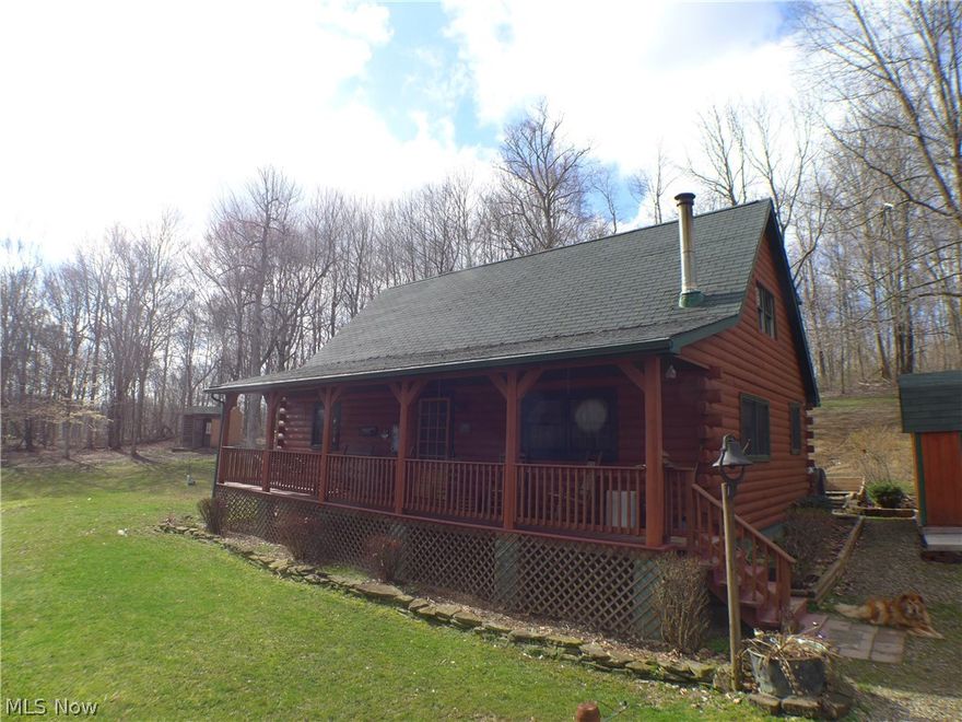 A stunning three bedroom log cabin nestled at the end of a prestigious cul de sac. Enjoy the beautiful natural sunlight through the primarily open first floor (16 ft. ceiling) & 1/2 story loft. Absolutely beautiful from the etched flooring at the entry to the efficient & spacious built in kitchen pantry/dining area cabinetry. Privacy abounds in this primarily wooded area including a fishing pond. Home is heat/cool with electric but also offers a rustic insurance approved wood burning stove. A Must See!